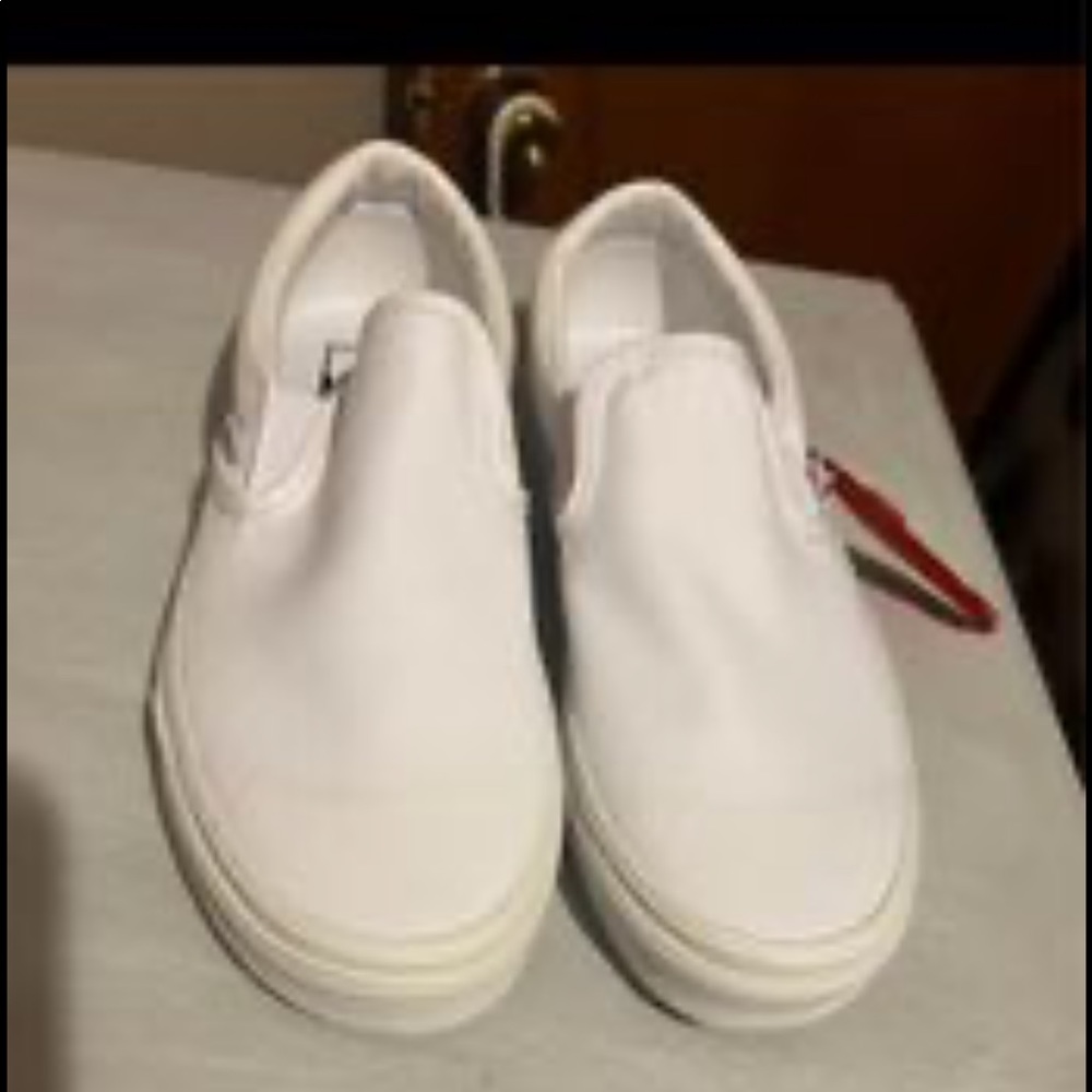 Vans true white slip on sneakers. Brand new in box.